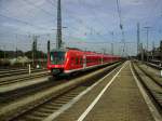 Ein dreifacher Zug der BR 440 ist am Vormittag des 09.08.2012 auf dem Weg nach Mnchen als er den Augsburger Hauptbahnhof verlsst.