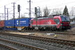 193 627-7 von Raillogix mit Containern am Haken Abfahrt in Bad Bentheim am 12.03.2022