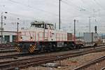 Mit einem Containertragwagen fuhr am Nachmittag des 30.01.2018 die NRAIL/Sersa/SBBC 1 275 008-1  Lea  über Gleis 1 durch den Badischen Bahnhof von Basel in Richtung Rheinhafen/Weil am Rhein.