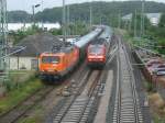 Am 07.Juli 2012 fuhr in Bergen/Rgen die 120 109 an der EKO Trans 143 001 vorbei.
