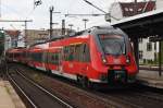 Hier 442 122-8 als RB22 (RB28817)  Airport-Express  von Berlin Schönefeld Flughafen nach Berlin Friedrichstraße mit 442 628-4 als RB21 (RB18261) von Golm nach Berlin Friedrichstraße, bei der Einfahrt am 27.6.2014 in Berlin Friedrichstraße.