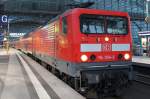 Hier 114 034-2 mit einem RE1 (RE18191) von Berlin Charlottenburg nach Frankfurt(Oder), bei der Ausfahrt am 6.4.2012 aus Berlin Hbf.