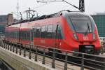 Hier 442 822-3 als RE7 (RE18714) von Dessau Hbf. nach Wünsdorf-Waldstadt, bei der Ausfahrt am 1.7.2013 aus Berlin Hbf. 