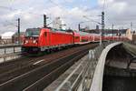 147 006 fährt am 19.02.2021 mit der RB14 (RB18616)  Airport-Express  von Flughafen Berlin/Brandenburg Terminal 1-2 nach Nauen in den Berliner Hauptbahnhof ein.