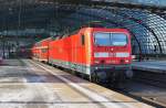 Hier 143 210-3 mit einer RB14 von Nauen nach Berlin Schönefeld Flughafen, bei der Ausfahrt am 30.1.2012 aus Berlin Hbf.