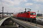 Hier 114 039-1 mit einem RE7 von Berlin Zoologischer Garten nach Zossen, bei der Ausfahrt am 6.4.2012 aus Berlin Hbf.