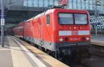 Hier 114 034-2 mit einem RE1 (RE18185) von Berlin Charlottenburg anch Frankfurt(Oder), bei der Ausfahrt am 6.4.2012 aus Berlin Hbf.