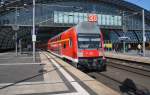 Hier eine RB14 (RB18915) von Nauen nach Berlin Schönefeld Flughafen, bei der Ausfahrt am 1.5.2013 aus Berlin Hbf.