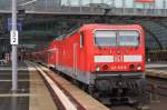 Hier 143 812-6 mit einer RB14 (RB18912) von Berlin Schönefeld Flughafen nach Nauen, bei der Einfahrt am 1.7.2013 in Berlin Hbf.