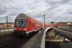 Hier eine RB14 (RB18925) von Nauen nach Berlin Schönefeld Flughafen, bei der Ausfahrt am 15.3.2014 aus Berlin Hbf.