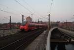 Hier 442 835-5 als RE7 (RE18727)  Airport-Express  von Wünsdorf-Waldstadt nach Borkheide, bei der Einfahrt am 29.3.2014 in Berlin Hbf.