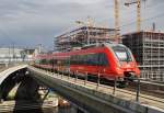 Hier 442 320-8 als RE7 (RE18726)  Airport-Express  von Dessau Hbf. nach Berlin Schönefeld Flughafen, bei der Ausfahrt am 14.6.2014 aus Berlin Hbf.