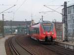 442 323 unterwegs,am 25.Oktober 2014,auf der Stadtbahn bei der Ausfahrt aus Berlin Hbf.