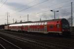 Hier eine RB14 (RB18570) von Senftenberg nach Berlin Schönefeld Flughafen, bei der Einfahrt am 6.2.2013 in Berlin Schönefeld Flughafen.