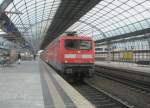 Hier 112 184-7 mit einem RE2 von Knigs Wusterhausen nach Rahtenow, bei der Ausfahrt am 1.4.2010 aus Berlin Spandau.