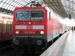 143 221 0 mit einer RB aus Nauen im Bahnhof von Berlin Spandau am 13.10.2010