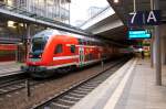 RE5 (RE 4362) von Lutherstadt Wittenberg nach Rostock Hbf in Berlin Südkreuz und gezogen hatte die 112 103-7. 10.02.2015