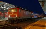 143 098 stand am 06.01.12 mit einer neuen Dosto-Garnitur in Bitterfeld.