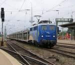 140 866-5 der MWB/EVB mit leeren Autotransportwagen in Fahrtrichtung Süden.