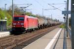 185 339 durchfhrt am 25.04.09 Burgkemnitz mit einem Kesselwagenzug Richtung Halle/Leipzig.