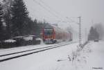 Im dichten Schneetreiben verlsst 143 038 den HP Chemnitz-Grna in Richtung Zwickau, 09.12.2012