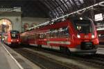 612 105 geht als RE17013 Dresden - Grlitz auf die Strecke, whrend 442 313 als RE17079 aus Leipzig kam; Dresden Hbf, 17.12.2012.