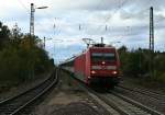 101 115-4 mit dem EC 9 von Hamburg Altona nach Chur HB am Nachmittag des 02.11.13 bei der Durchfahrt des Bahnhofs Emmendingen.