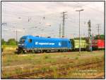 253 013-7 der Pressnitzbahn mit einem Cargozug im Bf Falkenberg(Elster), 10.07.06.