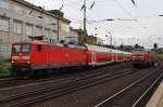 Hier 112 149-0 mit RE21021 von Kiel Hbf.