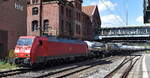 DB Cargo Scandinavia A/S, Taastrup [DK] mit ihrer  EG 3110  [NVR-Nummer: 91 86 0103 110-0 DK-DBCSC] und einem gemischten Kessel- und Silowagenzug am 15.07.24 Höhe Bahnhof Hamburg-Harburg.