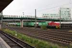 Am 12.08.2014 fuhr 512 011-8 mit ein paar Containerwagen durch Hamburg Wilhelmsburg in Richtung Norden.