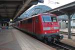 Am 02.09.2013 bespannte die Ludwigshafener 111 033-7 die RB 38824 von Karlsruhe Hbf nach Mannheim Hbf. Hier steht der Zug auf Gleis 4 des Startbahnhofes.