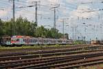 Am Mittag des 22.06.2019 fuhr VIAS ET 406 A (428 140-8) zusammen mit VIAS ET 412 A (428 146-5), als diese auf dem Weg von Neuwied nach Frankfurt (Main) HBf waren, am Rangierbahnhof und DB Museum in Koblenz Lützel vorbei in Richtung Koblenz Hauptbahnhof.