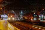 111 118 mit RE9 und Thalys 4332 in Köln Hbf, am 01.01.2023.