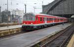 Ein Garnitur von Karlsruher Steuerwagen und N-wagen mit RE nach Aachen bei Ausfahrt von Kln Hnf am 28.