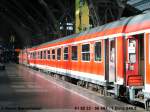 Einer der eingereihten alten IR Wagen der Bauart Bimz vor einem Sonderzug von Dresden Hauptbahnhof nach Warnemnde ber Leipzig Hbf, Bln.