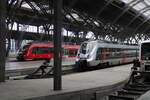 DB 442 639 als S 37766 (S10) nach Leipzig Miltitzer Allee und abellio 9442 813 als RB 74616 nach Eisenach, am 13.02.2023 in Leipzig Hbf.