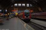 RB54 (RB 26112/RB 17871) von Leipzig Hbf nach Lutherstadt Wittenberg ber Dessau im weihnachtlichen Leipziger Hbf und geschoben hatte die 143 034-7.