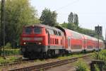 218 439-8 auf dem Weg von Lindau nach Stuttgart, in Krze wird der Zug den Lindauer Bahndamm verlassen und ber die Grtelbahn nach Friedrichshafen fahren, aufgenommen am 30.06.2012 