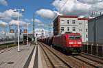 Am 24.05.2014 fuhr 185 217-7 mit einem Schotterzug durch Ludwigshafen (Rhein) Mitte gen Saarland.