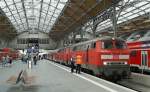 Ein 218er-Doppelpack, bestehend aus 218 158-4 und 218 260-8, am 29.06.2008 mit einem RE aus Kiel Hbf im frisch renovierten Lbecker Hauptbahnhof.