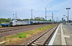 Vectron mal drei in Magdeburg Hbf (2/3):  Kesselzug mit 193 096-5 (Siemens Vectron) zieht in Magdeburg Hbf an einem Schwellenzug in südwestlicher Richtung vorbei.