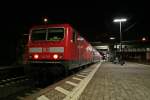 143 107 mit einer RB75 von Wiesbaden ber Darmstadt nach Aschaffenburg am Abend des 04.10.13 beim Halt in Mainz-Bischofsheim.