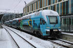 Westbahn 4010 128 im Klimaticket-Design wartet in München Hbf auf seinen weiteren Einsatz in Richtung Österreich.