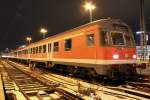 Die 111 026-1 mit einem RE nach Kufstein in Mnchen HBF am 17.12.2012