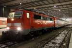 Die 111 049-3 mit der RB nach Ingolstadt Nord am 26.01.2013 in Mnchen HBF