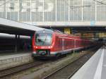 440 527-0 und zwei weitere baugleiche Triebzge stehen hier am 22.09.2013, in Mnchen Hbf, als RB nach Donauwth auf Gleis 12.