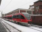 Ein Talent der Baureihe 643 fhrt von Mnster Hbf in Richtung der Abstellgleise.