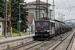 155 007 - ex DR 250 007 - mit einem Kesselwagenzug am 31.07.2023 im Hbf.