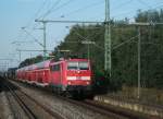 111 171 durchfhrt am 24.September 2011 mit der RB 59159 nach Mnchen, den Bahnhof Nrnberg-Eibach Richtung Schwabach.